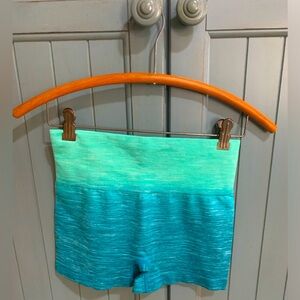 Homma athletic shorts, never worn, ombré teal, size small.
